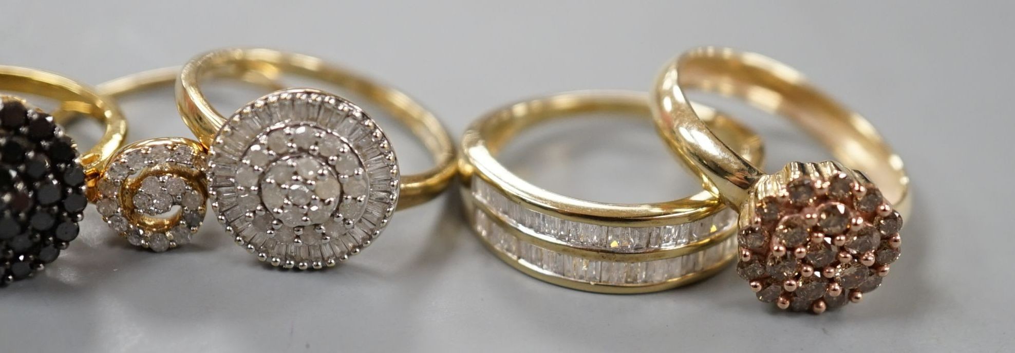 Four assorted modern 9ct gold and white or coloured diamond cluster set dress rings and two similar rings set in gilt 925